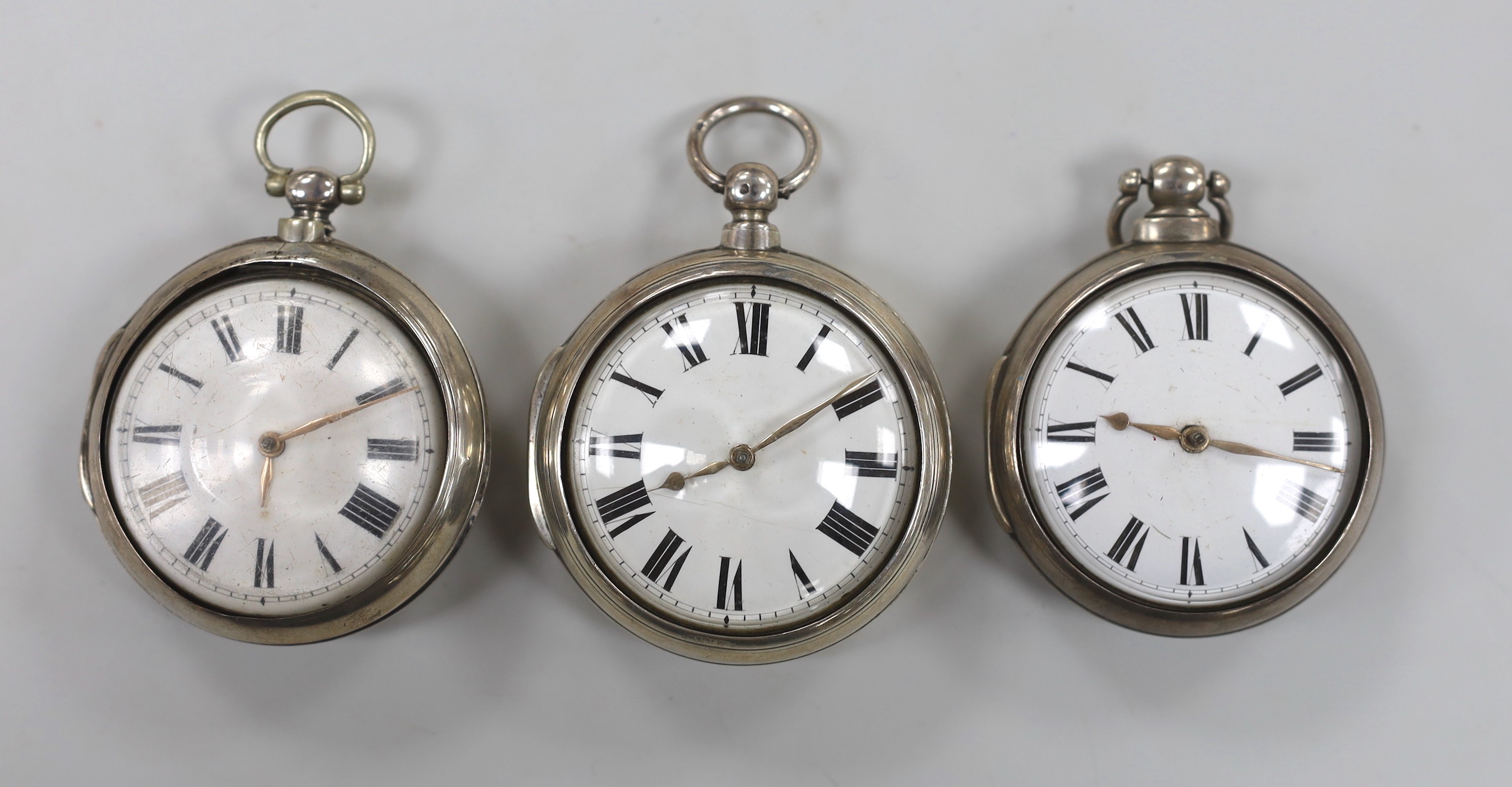 Three 19th century silver pair cased keywind verge pocket watches, by P. Matthew of Uckfield, the two others unsigned.